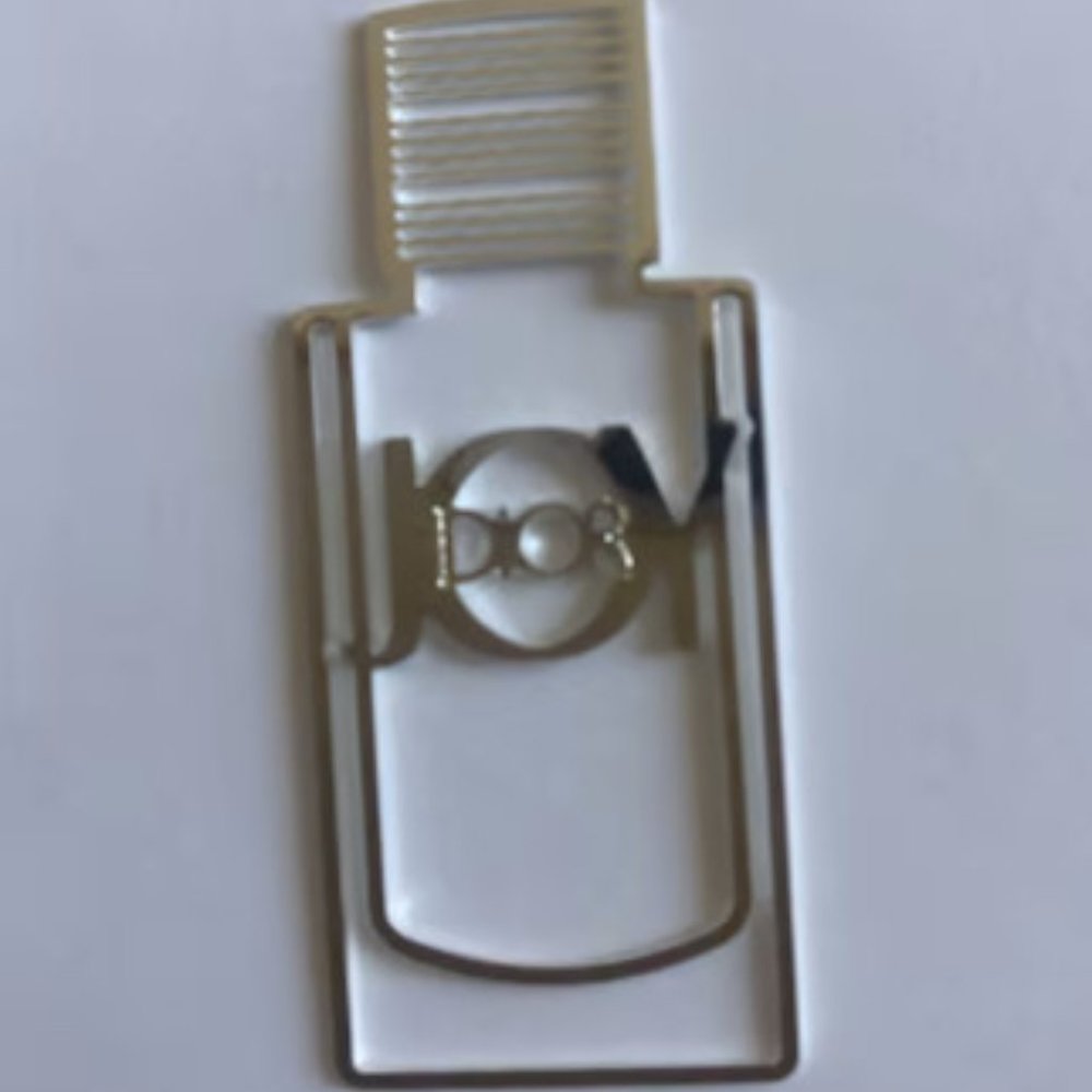 NWOT Dior JOY Silver 4 in one Bookmark/Hairclip/Pendant/Earring